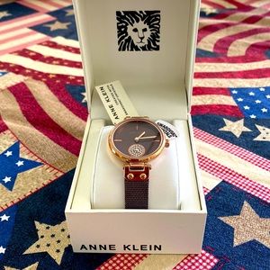 NWT Ladies’ Gold-accented watch, with Swarovski crystals.